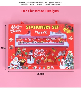 Detailed view of 6-piece Christmas stationery set with pencils, ruler and eraser in red