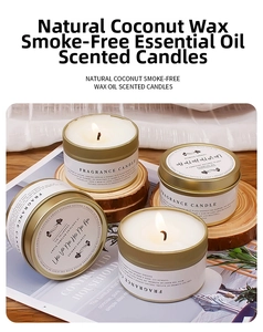 Natural coconut wax scented candles in white tin jars on a rustic wooden tray