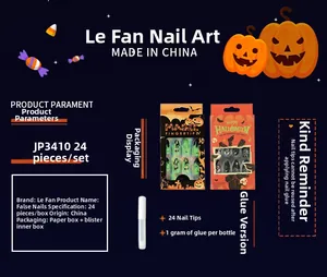 Macro view of Halloween press-on nails featuring pumpkin, ghost, and spider web designs