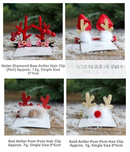 Detail view of festive Christmas reindeer antler hair clips with glitter and bows