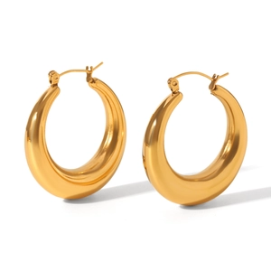 Detailed view of chunky 18K gold plated stainless steel teardrop hoop earrings on white background