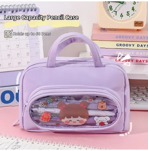 Macro detail of purple large capacity pencil case with transparent window and bear patterns