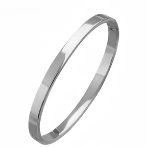 Close-up of a high-polished silver stainless steel bangle with a hidden clasp closure