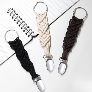 Braided cotton hat clips for travel in black, beige, and brown with metal buckles