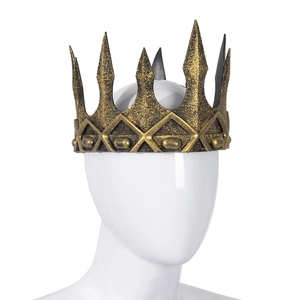 Detail of vintage bronze gold king crown with textured spikes for medieval cosplay