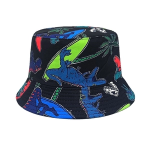 Close-up of kids black bucket hat featuring colorful cartoon dinosaur prints and palms