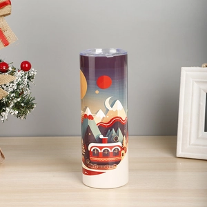 Close-up of a 20oz stainless steel travel mug featuring festive Christmas holiday illustrations