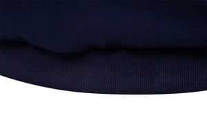 Macro shot showing high-density navy blue ribbed cotton cuffs on long sleeve sweatshirt