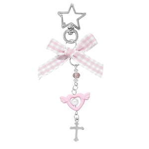 Pink ribbon bow keychain with winged heart, pearl, and silver star pendant on white backdrop