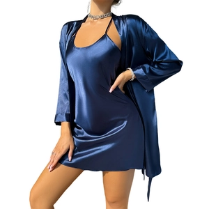 Women's two-piece navy blue satin pajama set including a slip dress and a robe