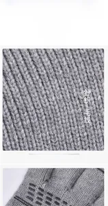 Detailed view of the thick gray knit texture and soft yarn weave of this winter balaclava