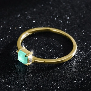 S925 silver ring featuring a square turquoise stone and small diamond on a gold band