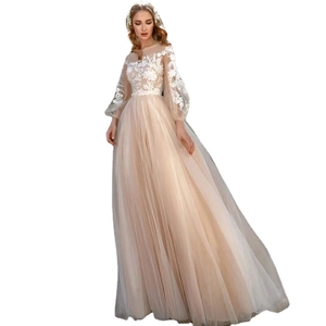Elegant champagne lace wedding dress with puff sleeves and sheer floral embroidery