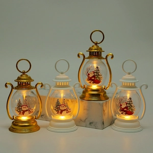 Set of four LED Christmas lanterns with snowman and Santa scenes on marble stands