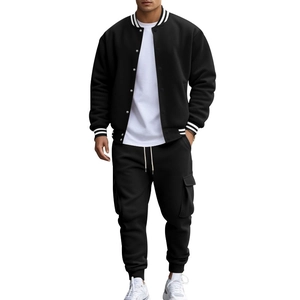 Full view of men's black varsity jacket set with cargo joggers on white background