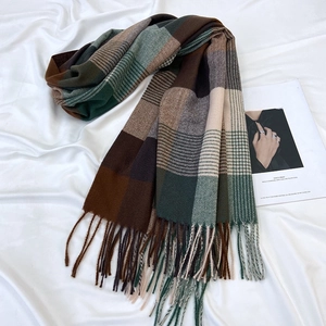Classic plaid tassel scarf in green and khaki cashmere-like fabric on white linen