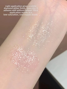 Arm swatches of matte purple liquid eyeshadow with glitter texture for eye makeup