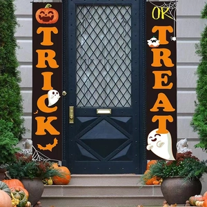 Halloween Trick or Treat porch banners with pumpkin and ghost motifs on front door