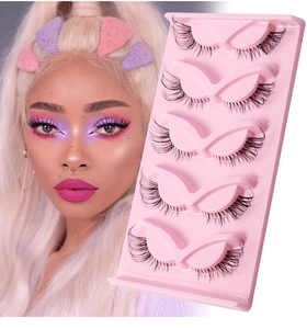 Detail showing 5 pairs of natural thick false eyelashes on a pink tray with model look