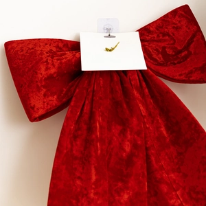 Large red velvet bow Christmas tree ornament for festive holiday home decoration