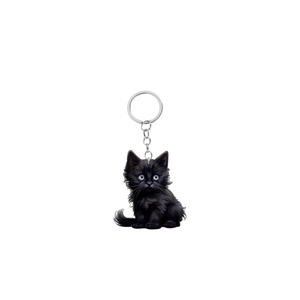 Close-up of black acrylic cat keychain with silver metal ring and double-sided print