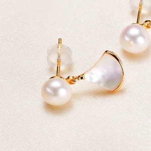 Elegant gold fan-shaped stud earrings with white mother-of-pearl and freshwater pearls