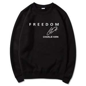 Detail of freedom Charlie Kirk text print on a black unisex long sleeve hoodie