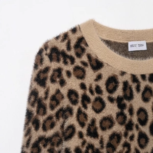 Women's leopard print knit sweater with fuzzy faux fur texture and crew neck design