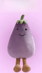 Detailed view of purple plush eggplant pendant with corduroy legs and green leaf top
