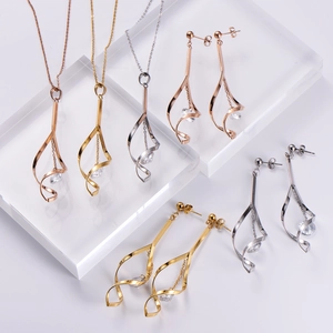 Minimalist geometric spiral jewelry set with necklace and earrings in three colors