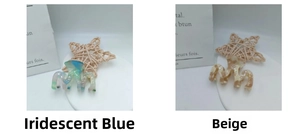 Detail of hollow wave-shaped acetate hair claws in iridescent blue and beige amber colors
