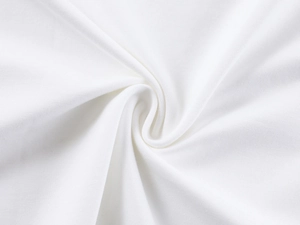 Detailed close-up of soft white knitted fabric texture with elegant draped folds