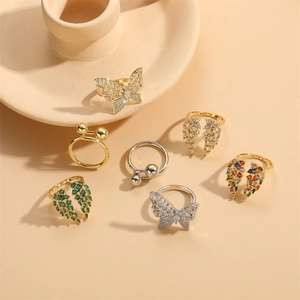 Bagues papillon asymétriques en zircon réglables avec finitions dorées et argentées