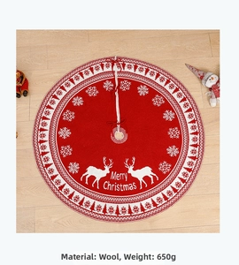Macro detail of red knitted Christmas tree skirt with reindeer and snowflake patterns