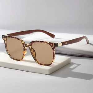 Retro polygon tea-colored sunglasses with tortoiseshell frames and wooden texture legs