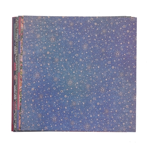 Christmas Magic European scrapbooking paper set with dark blue gold star patterns