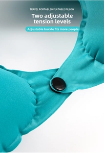 Detail showing two-position snap button adjustment on blue inflatable travel neck pillow