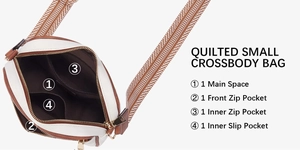 Detail view of the interior multi-pocket structure and crossbody strap of the cow print bag