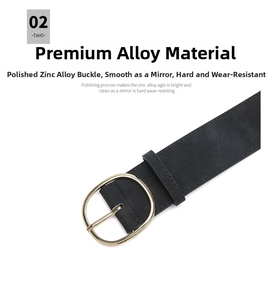 Détail d'une ceinture en cuir noir avec boucle ovale polie en alliage de zinc doré