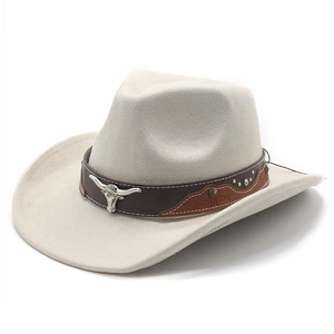 Close-up of wide-brim faux suede cowboy hat with vintage bull head metal buckle and rivets