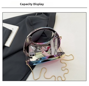 Capacity display of iridescent PVC clear bag with gold chain and circular handle