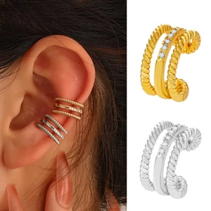 Detailed view of twist-textured cuff earrings with inlaid cubic zirconia for non-pierced ears
