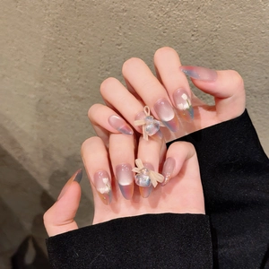 Handmade Monet Garden press-on nails with iridescent cat-eye effect and 3D charms