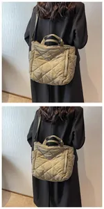 Quilted tote bag detail featuring large side pockets and soft padded nylon fabric textures
