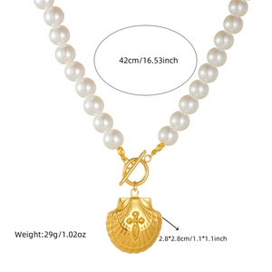 Vintage pearl necklace with gold shell cross pendant and detailed size specifications