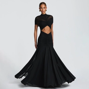 Detail view of black cut-out evening gown with pleated waist and fishtail hem