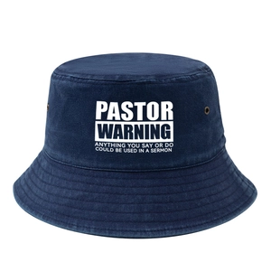 Detail of navy blue cotton bucket hat with white text print and metal eyelets