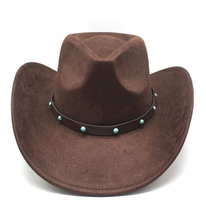 Detail of brown faux suede cowboy hat featuring turquoise studs on a leather band