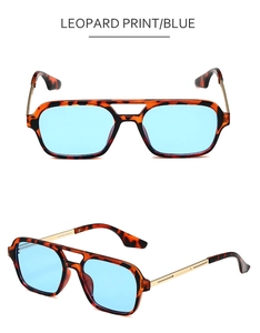 Retro aviator sunglasses featuring leopard print frames and light blue tinted lenses