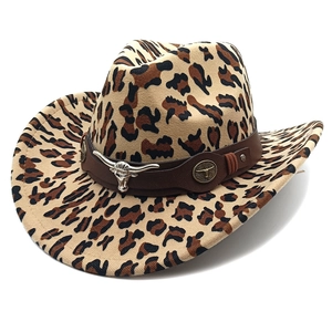 Detail of leopard print felt cowboy hat with leather band and silver bull head emblem